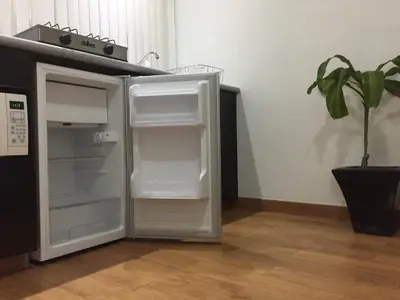 Una cocina o zona de cocina en Habitaciones amuebladas Veracruz Logos