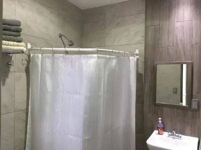 Un baño de Habitaciones amuebladas Veracruz Logos