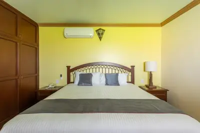 Cama o camas de una habitación en Hotel Ángel Inn