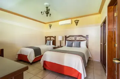 Cama o camas de una habitación en Hotel Ángel Inn