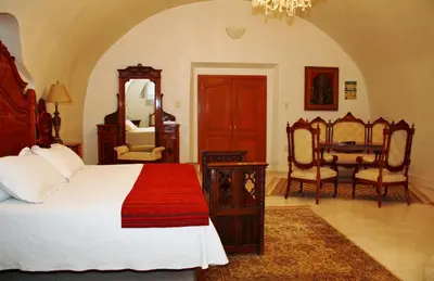Cama o camas de una habitación en Hotel Hacienda Vista Hermosa