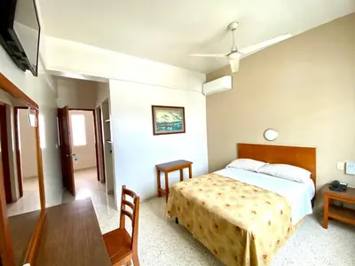Cama o camas de una habitación en Hotel Delfines - a 2 calles del Acuario Veracruz
