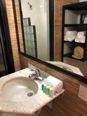 Un baño de VF Villa Florencia Hotel
