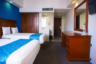 Cama o camas de una habitación en Hotel Lois Veracruz