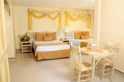 Cama o camas de una habitación en Villa las Margaritas Plaza Cristal