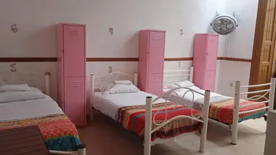 Cama o camas de una habitación en Hostal Santo Domingo