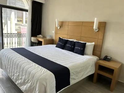Cama o camas de una habitación en Hotel Del Portal, Puebla