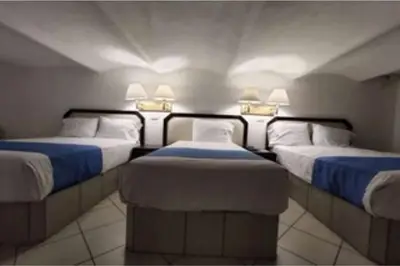 Cama o camas de una habitación en Hotel Del Portal, Puebla