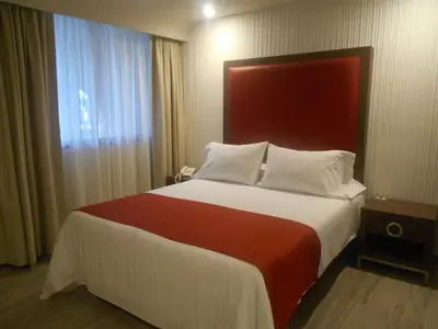 Cama o camas de una habitación en Hotel Puente Real
