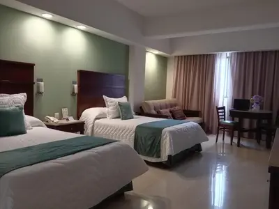Cama o camas de una habitación en Hotel Bello Veracruz