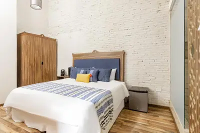 Cama o camas de una habitación en Hotel Milagro, Puebla Centro