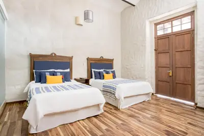 Cama o camas de una habitación en Hotel Milagro, Puebla Centro