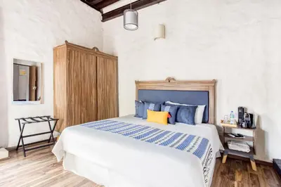 Cama o camas de una habitación en Hotel Milagro, Puebla Centro
