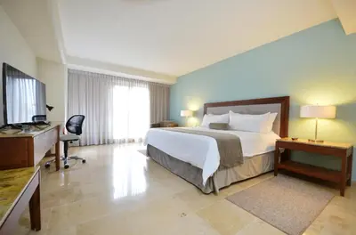 Cama o camas de una habitación en HB Xalapa