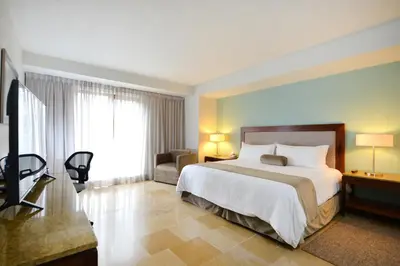 Cama o camas de una habitación en HB Xalapa