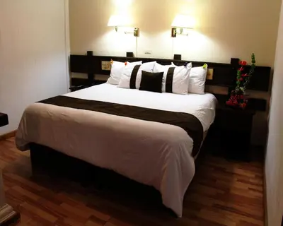 Cama o camas de una habitación en Hotel Misión Xalapa