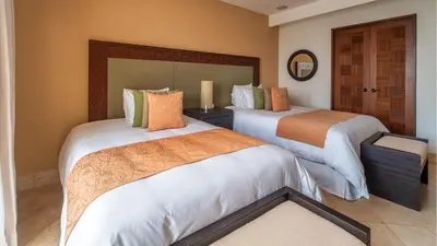 Cama o camas de una habitación en Celeste Beach Residences Huatulco Curamoria Collection