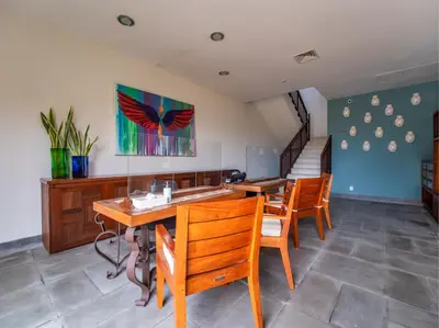 Zona de estar de Celeste Beach Residences Huatulco Curamoria Collection