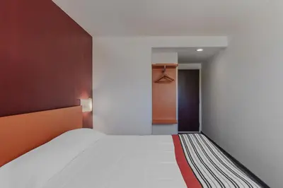 Cama o camas de una habitación en City Express Junior by Marriott Tuxtla Gutierrez Poliforum