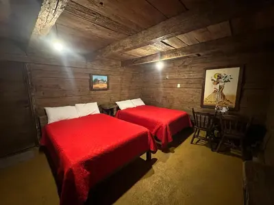 Cama o camas de una habitación en Cabañas Del Valle