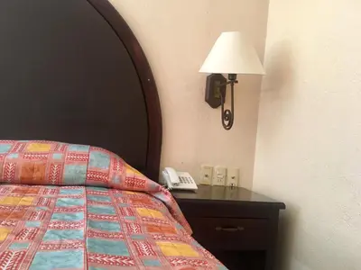 Cama o camas de una habitación en Hotel Acuario de Veracruz