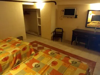 Cama o camas de una habitación en Hotel Acuario de Veracruz