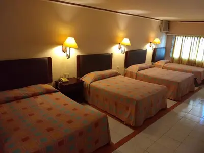 Cama o camas de una habitación en Hotel Acuario de Veracruz