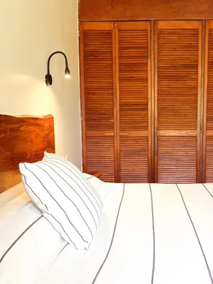 Cama o camas de una habitación en Hotel Suites Villasol
