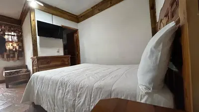 Cama o camas de una habitación en Hotel Colonial Taxco