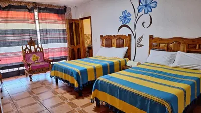 Cama o camas de una habitación en Hotel Colonial Taxco