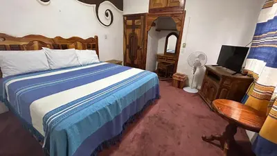 Cama o camas de una habitación en Hotel Colonial Taxco