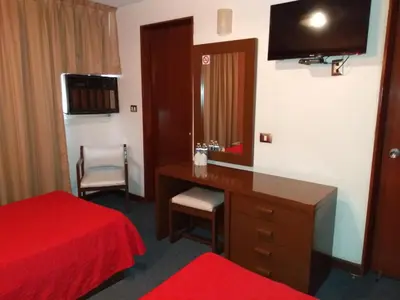 Cama o camas de una habitación en Hotel Maria Victoria Xalapa