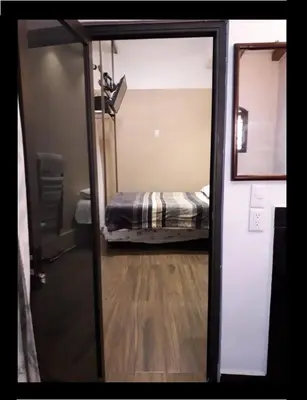 Cama o camas de una habitación en CIUDAD DE MEXICO UNAM Guest House Casa de Huespedes