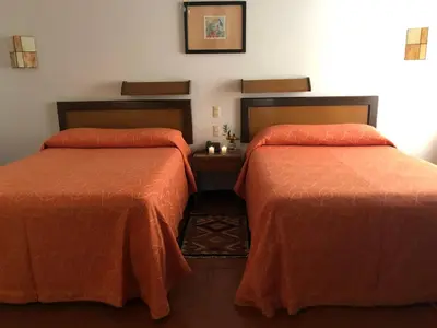 Cama o camas de una habitación en Hotel Ilebal Cuernavaca Centro - lugar con encanto!