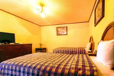 Cama o camas de una habitación en Hotel Lastra