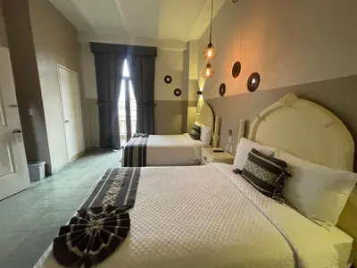 Cama o camas de una habitación en Hotel Casona Oaxaca