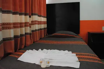 Cama o camas de una habitación en Hotel Jiménez
