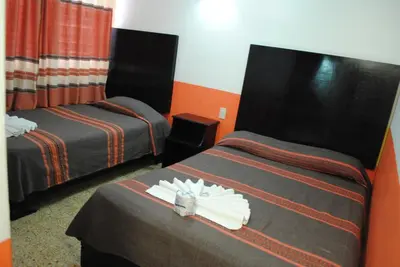 Cama o camas de una habitación en Hotel Jiménez