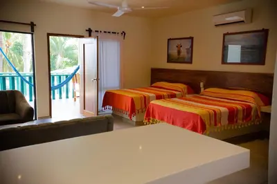 Cama o camas de una habitación en Bungalows Oasis
