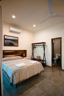 Cama o camas de una habitación en Bungalows Oasis