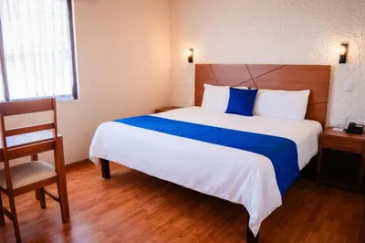 Cama o camas de una habitación en Hotel Del Angel, Apizaco
