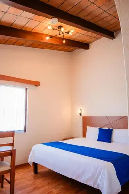 Cama o camas de una habitación en Hotel Del Angel, Apizaco