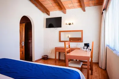 Una televisión o centro de entretenimiento en Hotel Del Angel, Apizaco