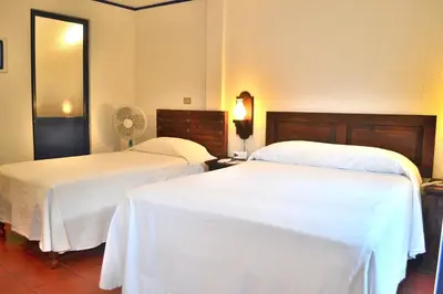 Cama o camas de una habitación en Posada del Cafeto