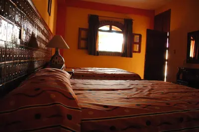 Cama o camas de una habitación en Hotel Boutique Posada la Casona de Cortés