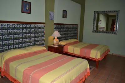 Cama o camas de una habitación en Hotel Boutique Posada la Casona de Cortés