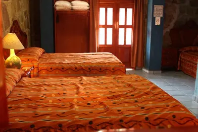 Cama o camas de una habitación en Hotel Boutique Posada la Casona de Cortés