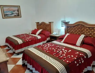 Cama o camas de una habitación en Hotel Imperial Jojutla
