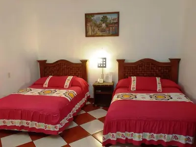 Cama o camas de una habitación en Hotel Imperial Jojutla