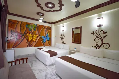 Cama o camas de una habitación en Hotel Diamante